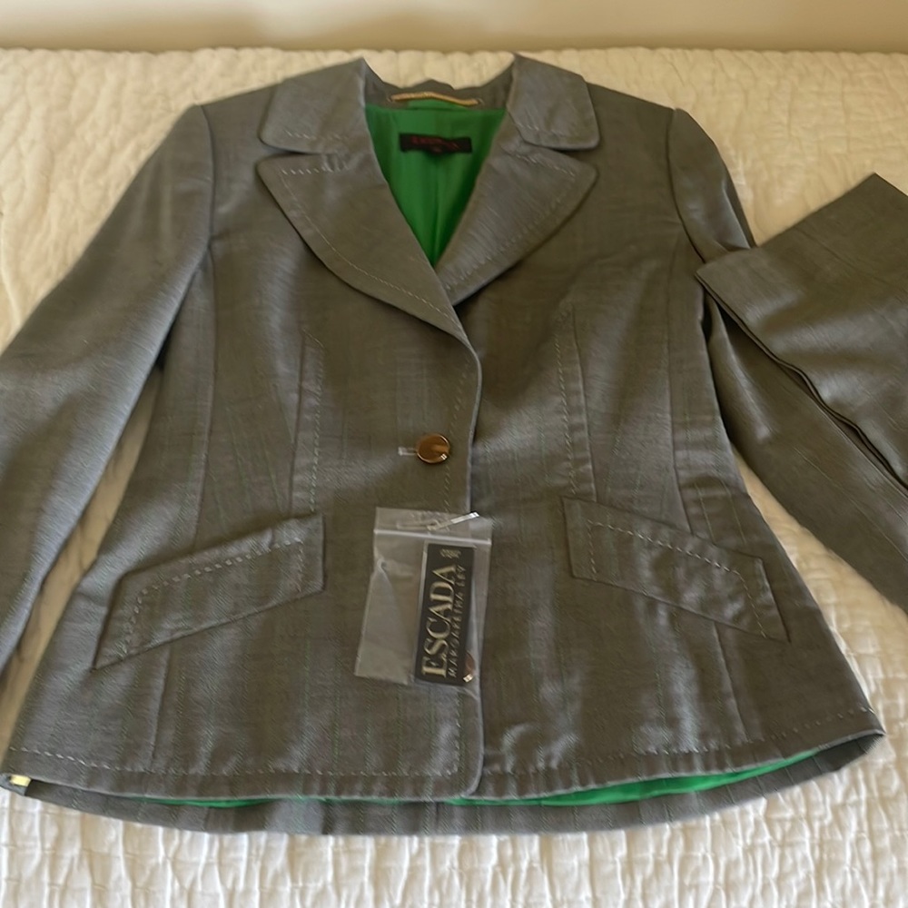 Ultimate power suit. Classy gray with green pinstripe and vibrant green lining.